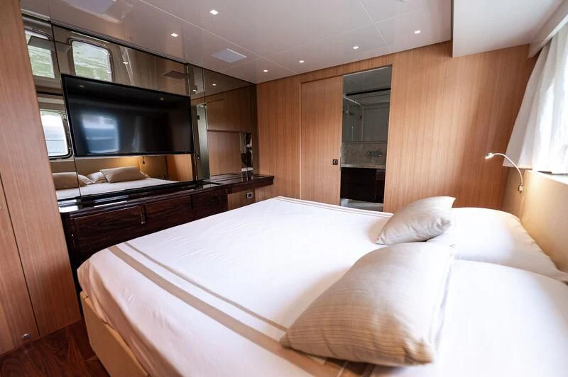 a bed in a room aboard VISSOTTA Yacht for Sale