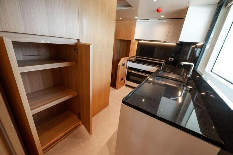 a kitchen with a sink and a stove aboard VISSOTTA Yacht for Sale