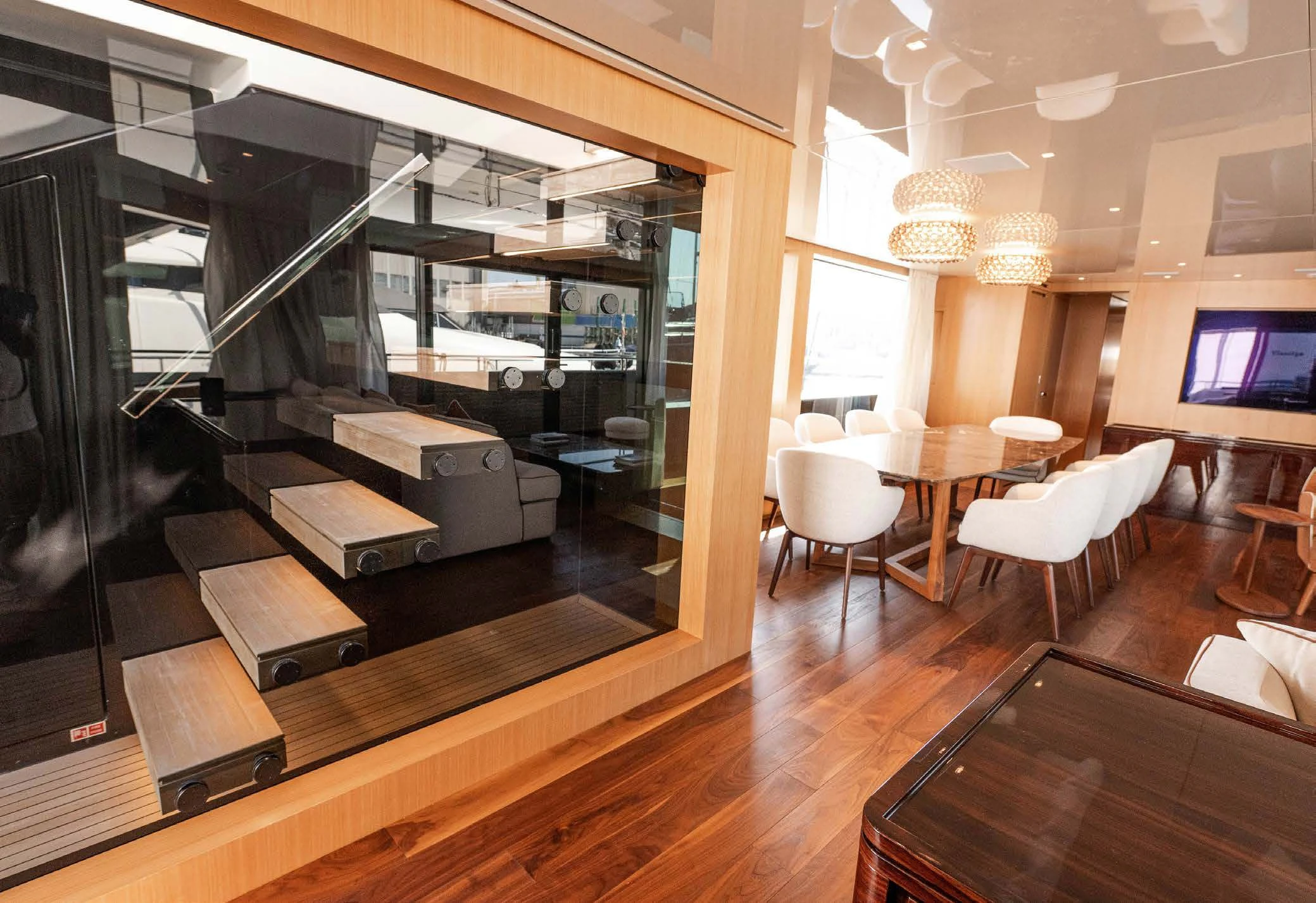 a room with a large mirror aboard VISSOTTA Yacht for Sale