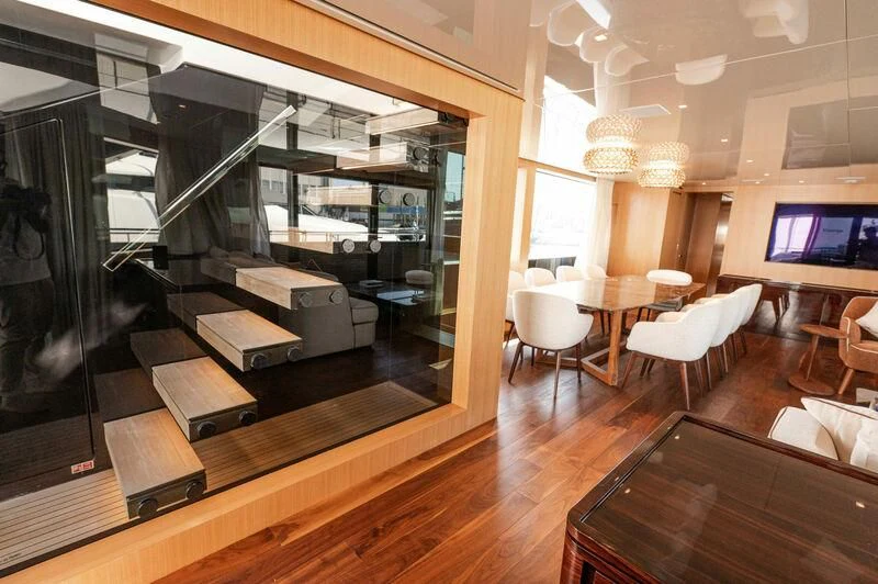 a room with a large mirror aboard VISSOTTA Yacht for Sale