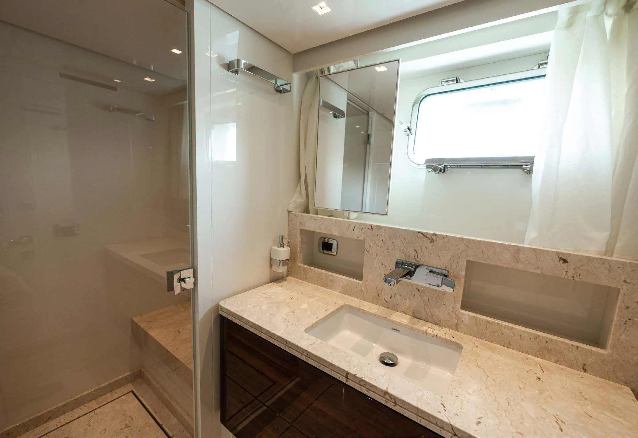 a bathroom with two sinks aboard VISSOTTA Yacht for Sale