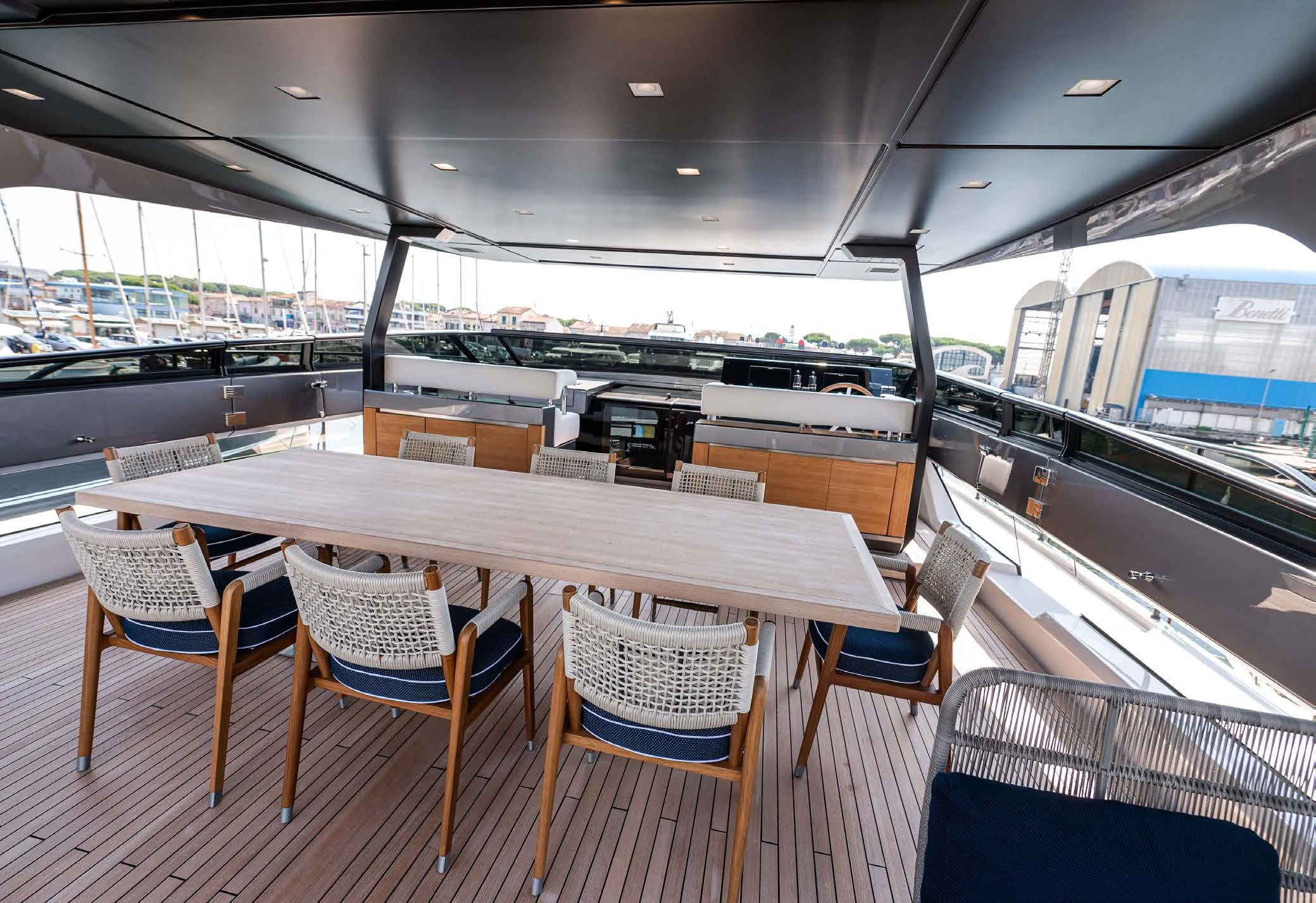 a table and chairs on a bus aboard VISSOTTA Yacht for Sale