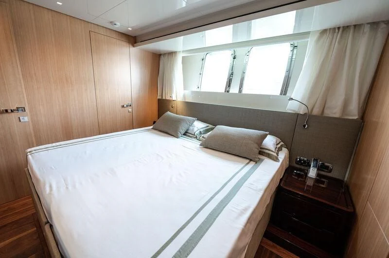a bed in a room aboard VISSOTTA Yacht for Sale