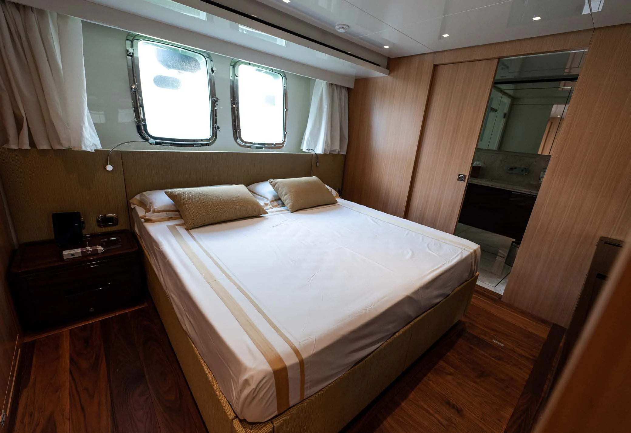 a bed in a room aboard VISSOTTA Yacht for Sale