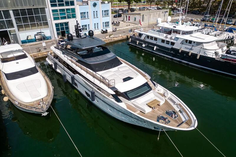 a group of boats sit in a harbor aboard VISSOTTA Yacht for Sale