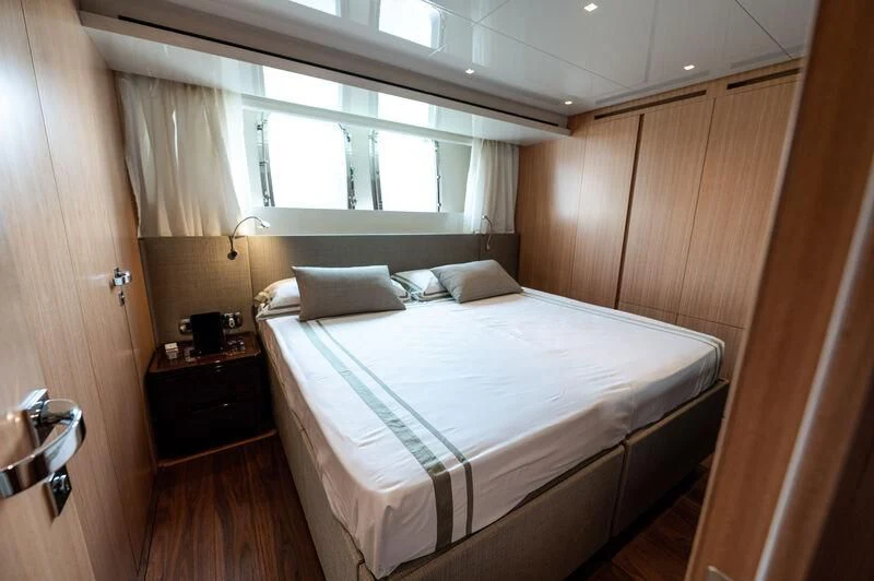 a bed in a room aboard VISSOTTA Yacht for Sale