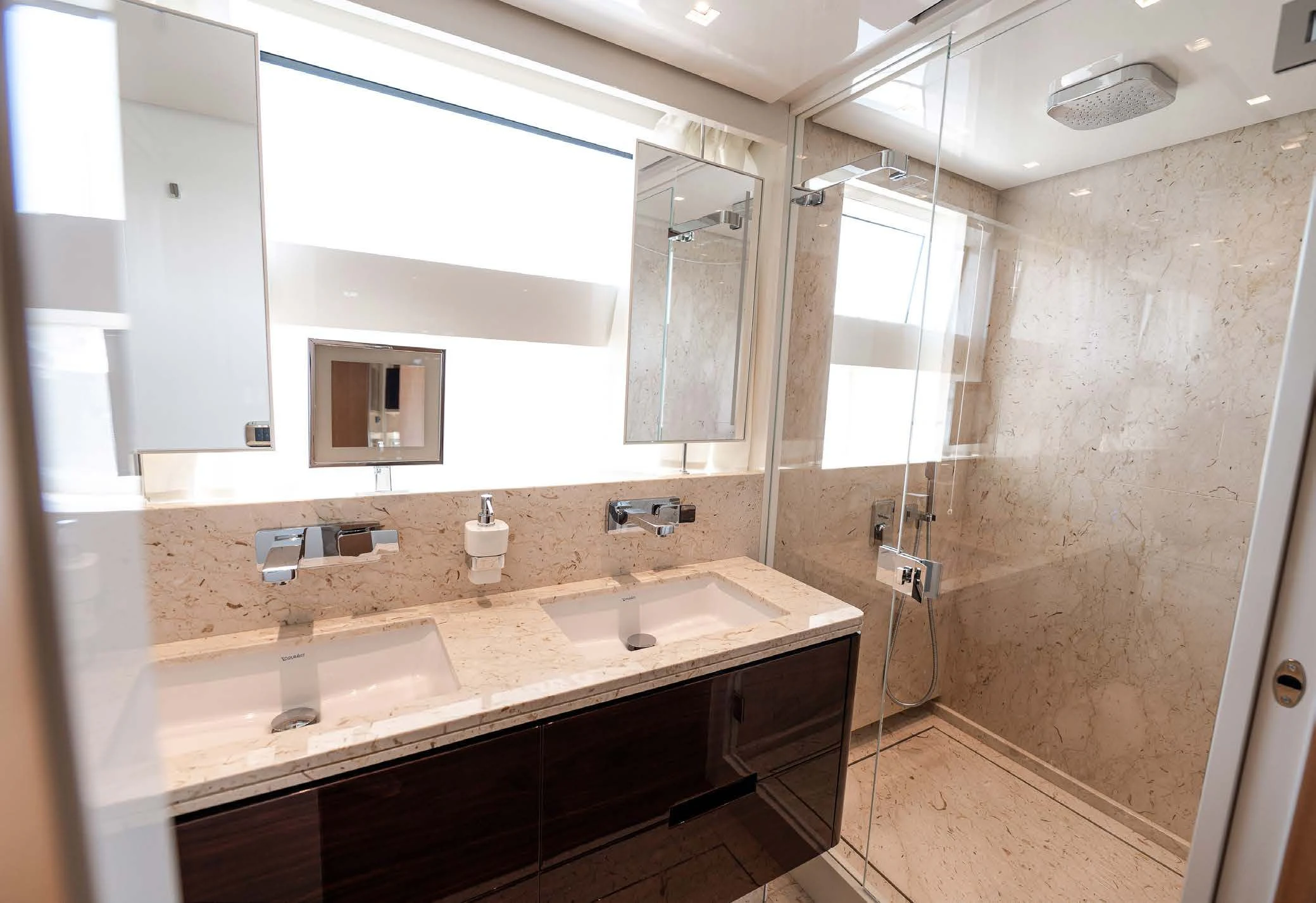 a bathroom with a large countertop aboard VISSOTTA Yacht for Sale