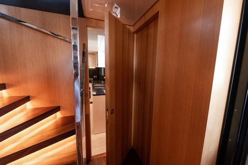 a room with wooden walls aboard VISSOTTA Yacht for Sale