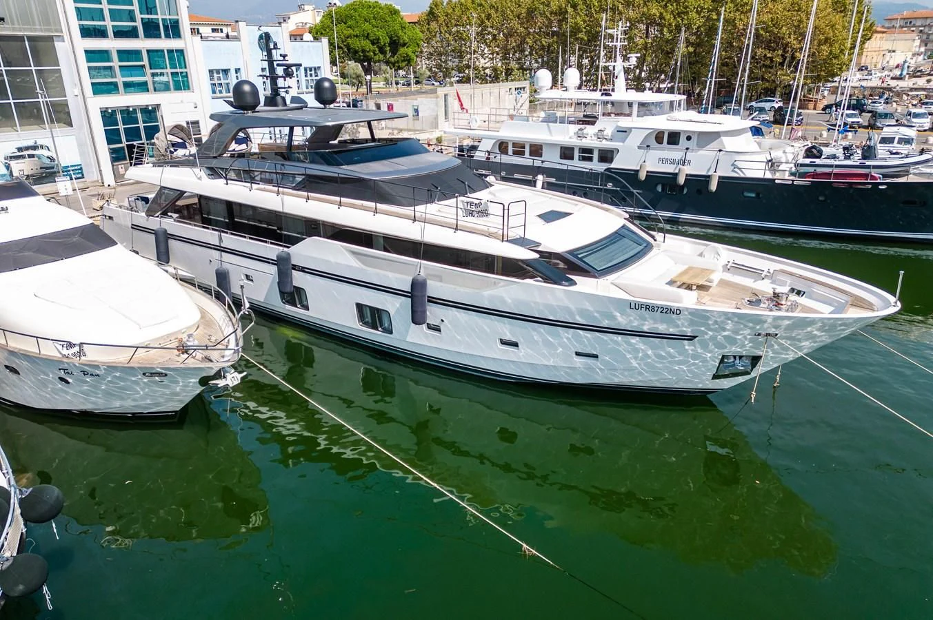 a group of boats are parked in a harbor aboard VISSOTTA Yacht for Sale