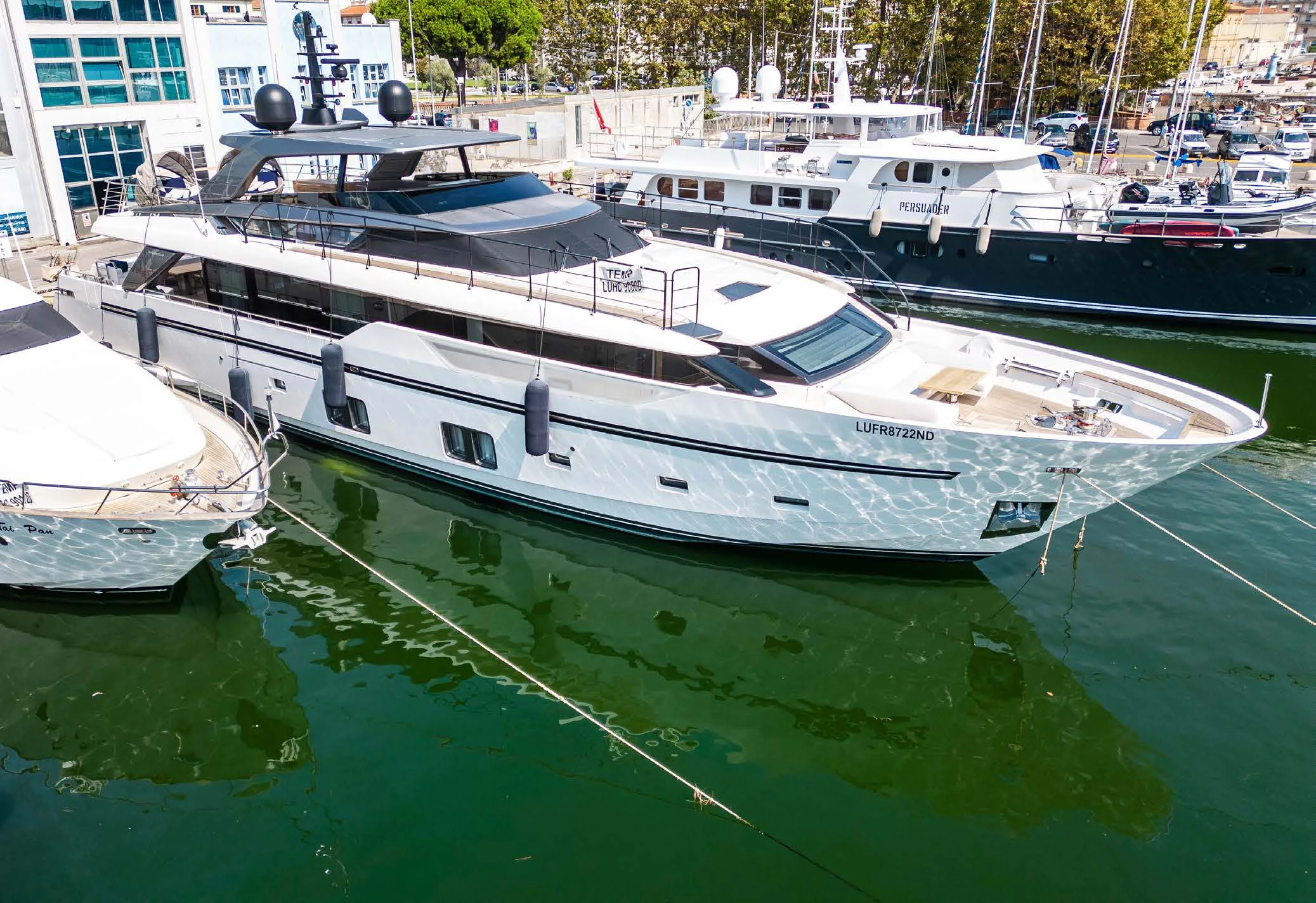 a group of boats in a harbor aboard VISSOTTA Yacht for Sale