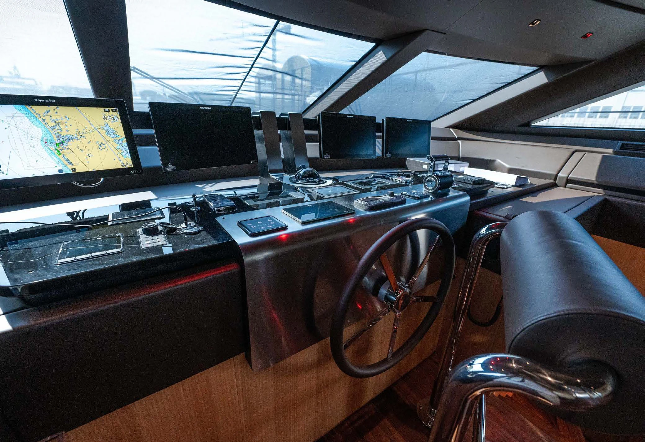 a desk with computers aboard VISSOTTA Yacht for Sale
