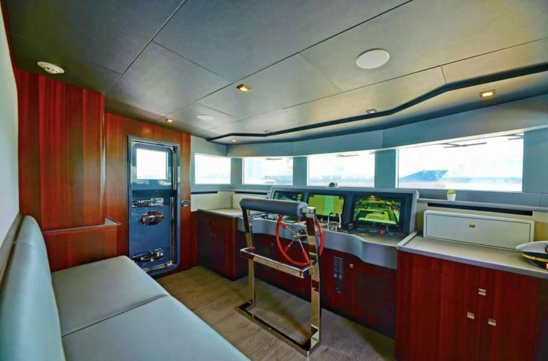 a room with a desk and a computer aboard BOKE 125 Yacht for Sale