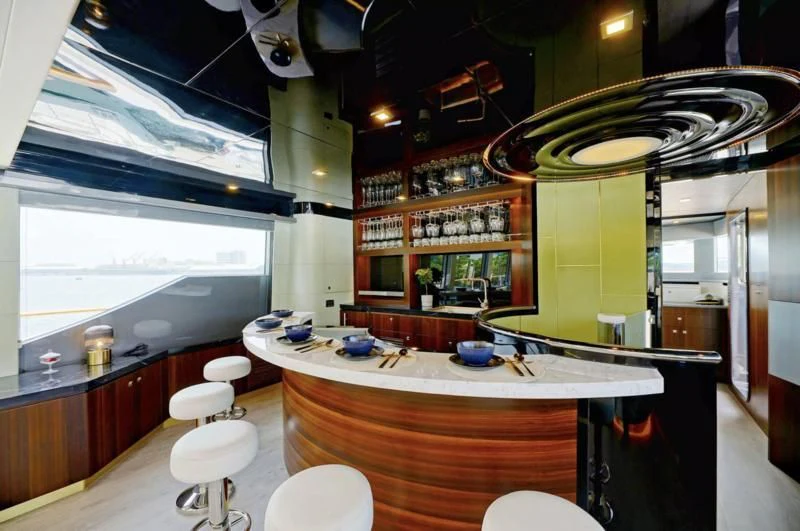 a kitchen with a countertop sink and cabinets aboard BOKE 125 Yacht for Sale