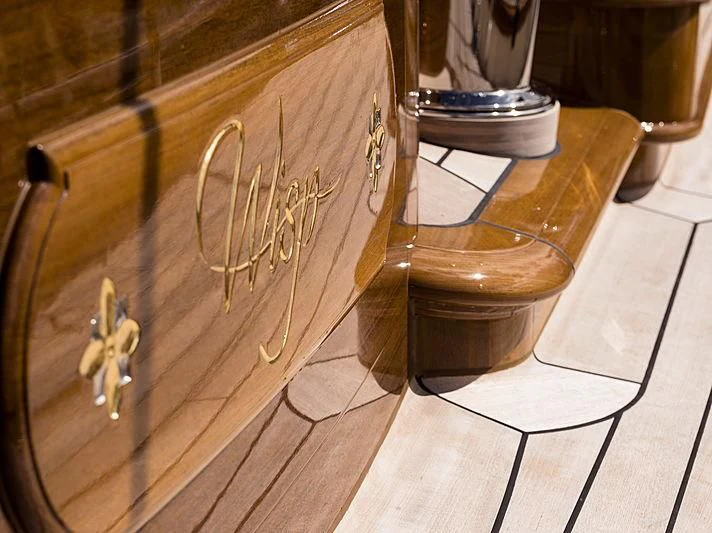 a wooden barrel with a metal handle aboard WISP Yacht for Sale