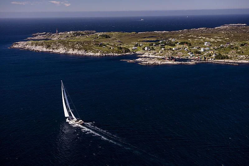 a boat sailing on the sea aboard WISP Yacht for Sale