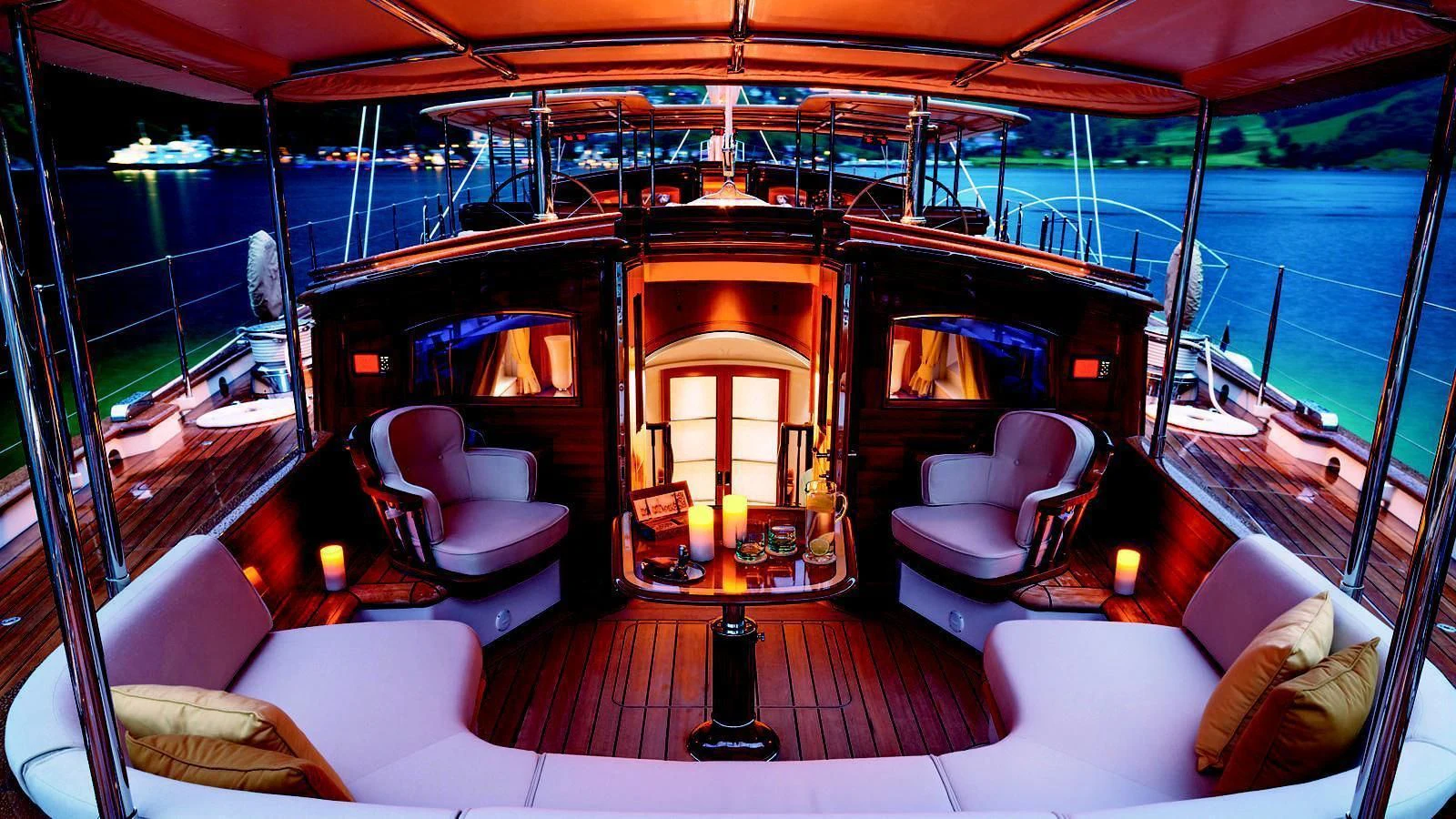 a room with a view of the ocean and the deck aboard WISP Yacht for Sale