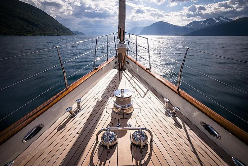 a large ship on the water aboard WISP Yacht for Sale