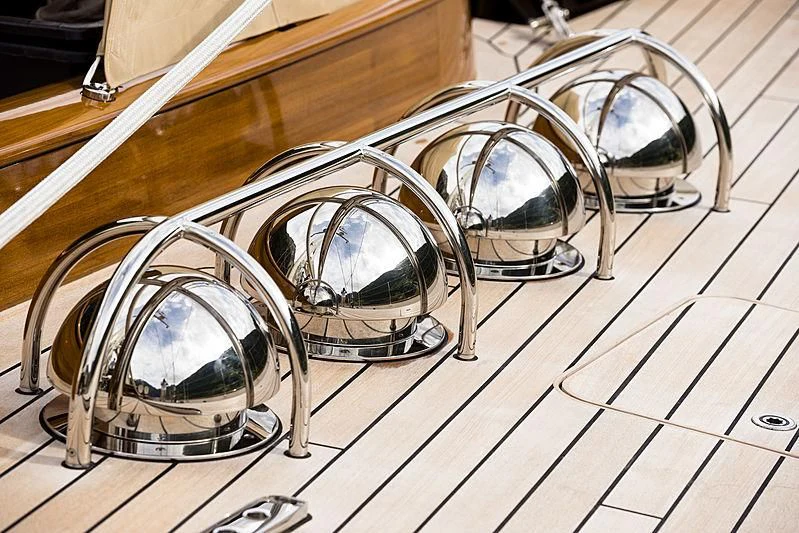 a pair of sunglasses on a table aboard WISP Yacht for Sale