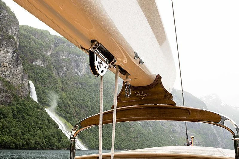 a boat with a person on it aboard WISP Yacht for Sale