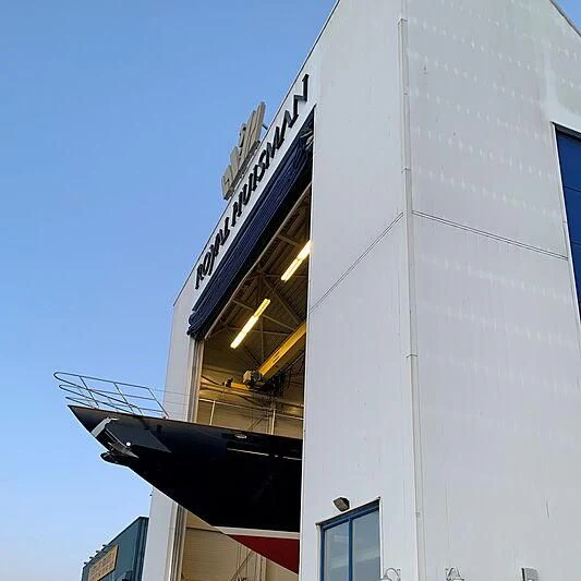 a tall building with a tower aboard WISP Yacht for Sale