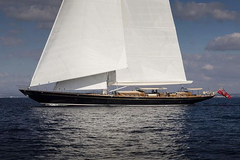 a large sailboat on the water aboard WISP Yacht for Sale