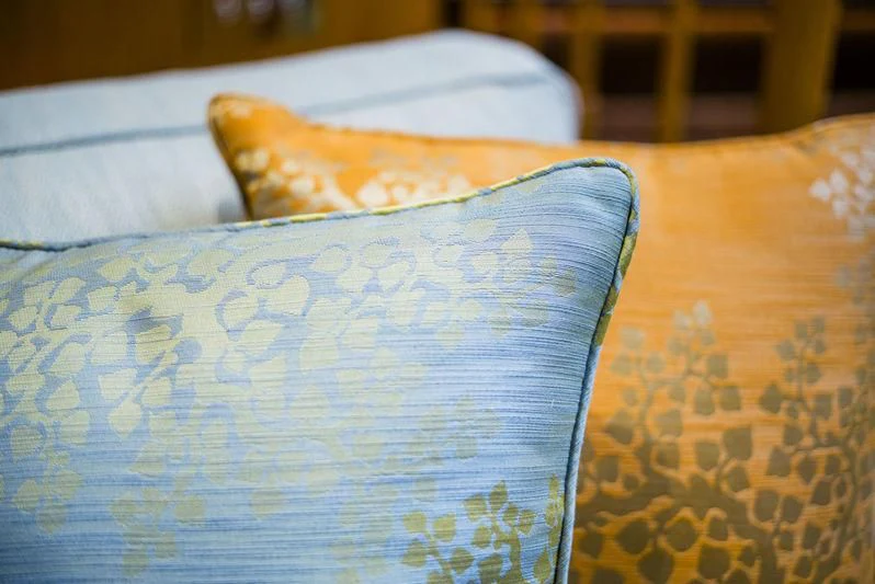 a pillow on a bed aboard WISP Yacht for Sale