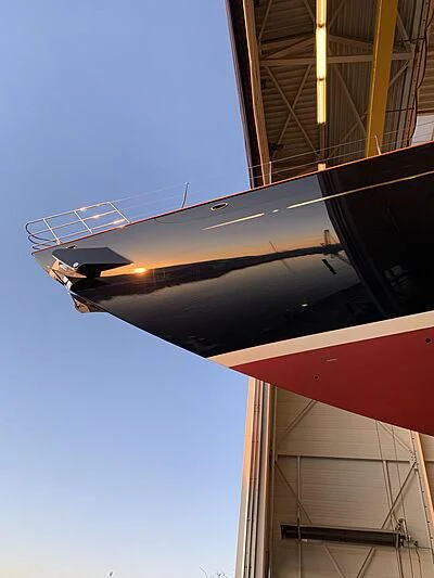 a plane flying in the sky aboard WISP Yacht for Sale
