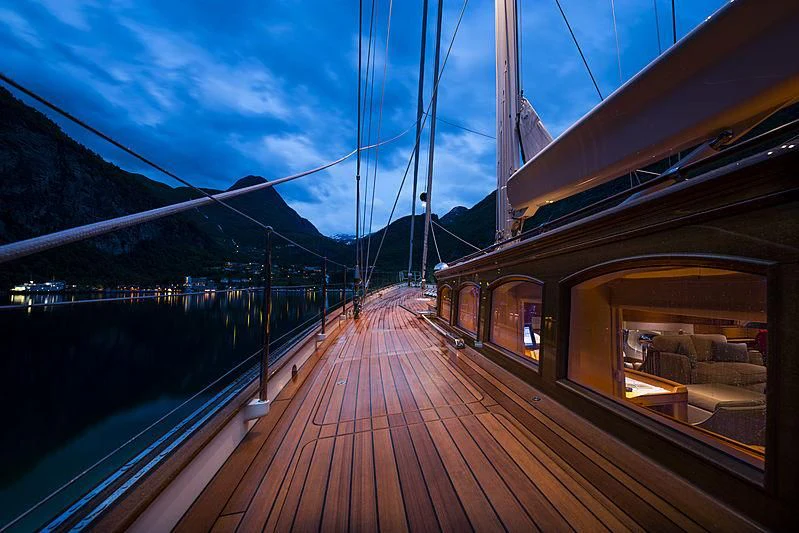 a wooden dock over a body of water aboard WISP Yacht for Sale