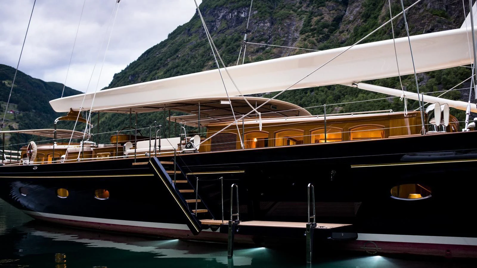 a boat docked at a pier aboard WISP Yacht for Sale