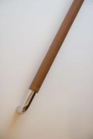 a wooden sword on a white surface aboard WISP Yacht for Sale