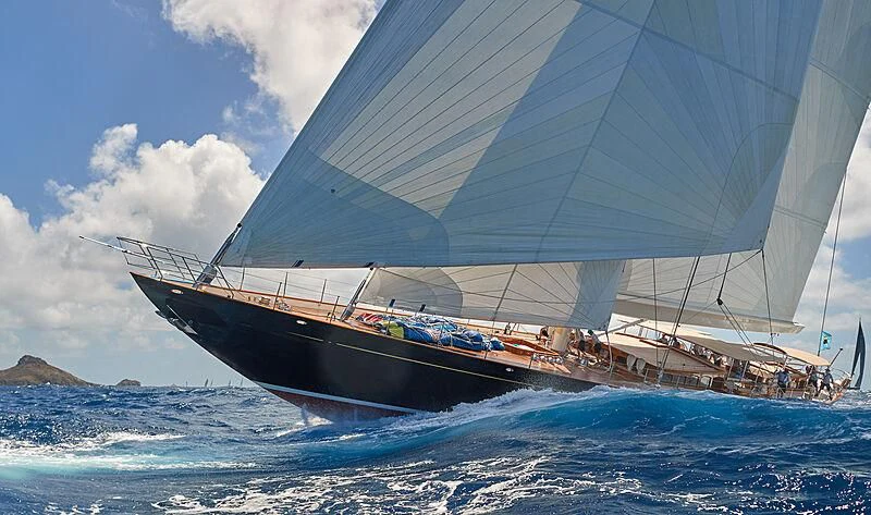 a large ship in the water aboard WISP Yacht for Sale