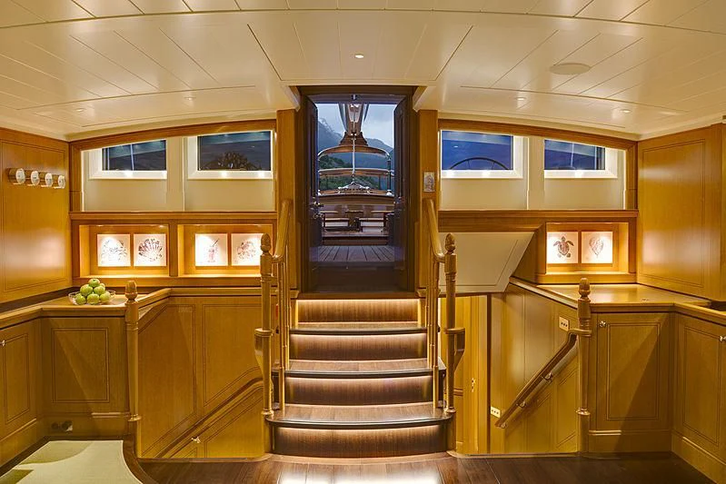 a wooden staircase inside a building aboard WISP Yacht for Sale