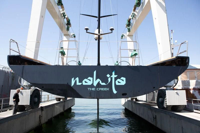 a large boat with a large body of water in the background aboard BULLITT Yacht for Sale