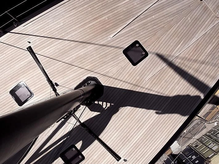 a close-up of a person playing a pool aboard BULLITT Yacht for Sale