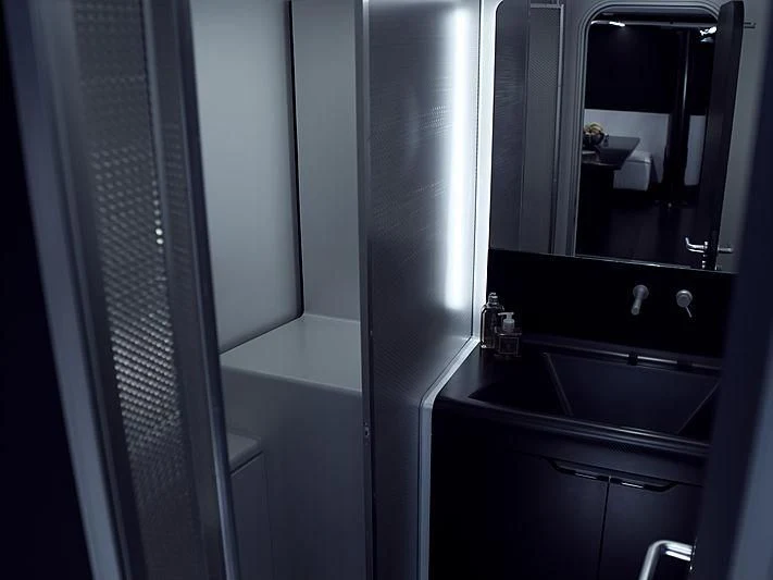 a bathroom with a sink and a mirror aboard BULLITT Yacht for Sale