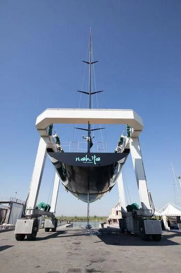 a large white boat with a large propeller on it aboard BULLITT Yacht for Sale