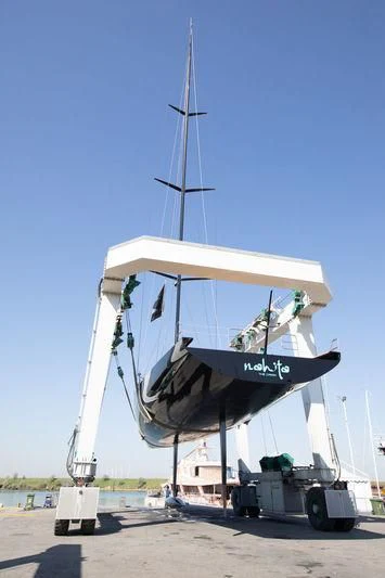 a large boat on a trailer aboard BULLITT Yacht for Sale