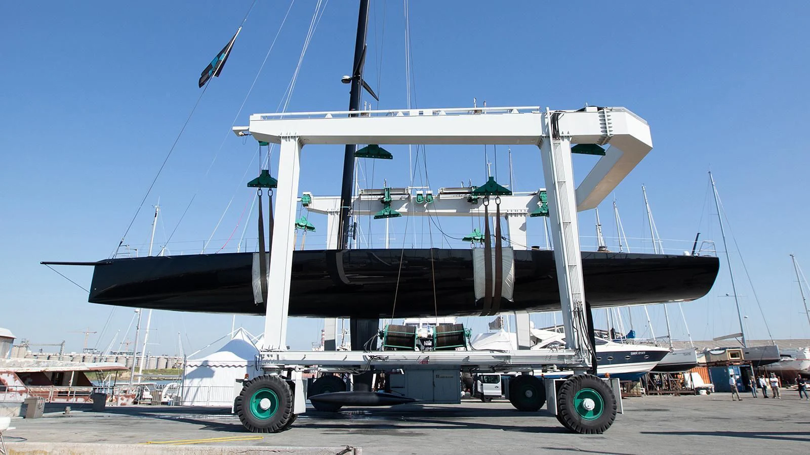 a large white boat on a trailer aboard BULLITT Yacht for Sale