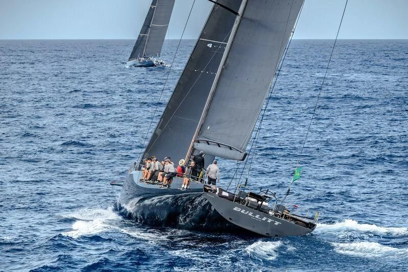 a group of people sailing on a sailboat aboard BULLITT Yacht for Sale