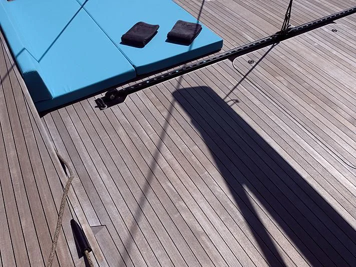 a satellite dish on a wooden deck aboard BULLITT Yacht for Sale