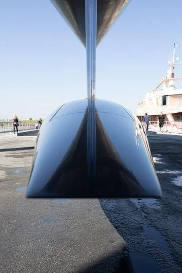 a large blue and white umbrella aboard BULLITT Yacht for Sale