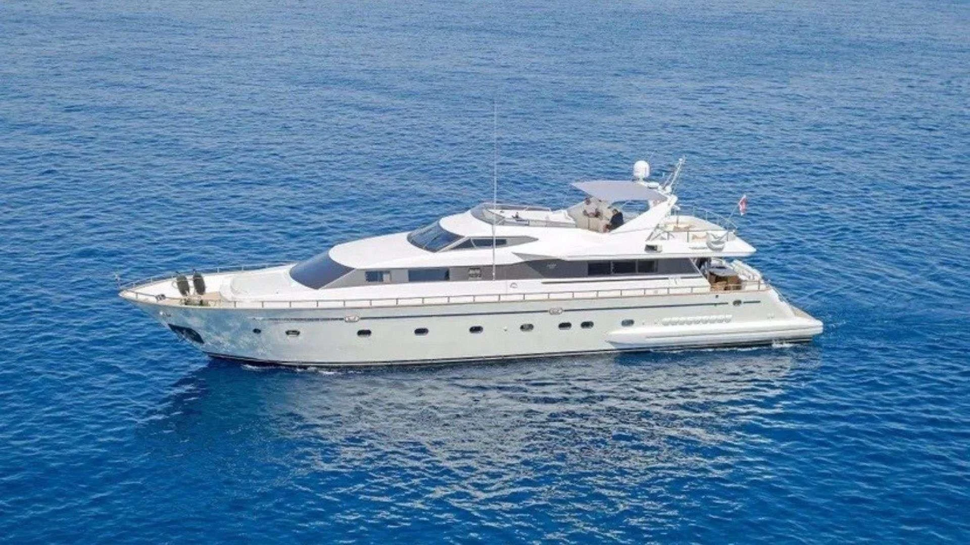 a white yacht in the water aboard ILLYA F Yacht for Charter