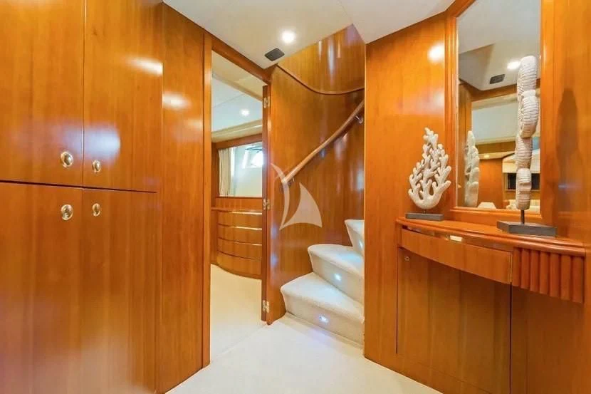 a bathroom with wood cabinets aboard ILLYA F Yacht for Charter