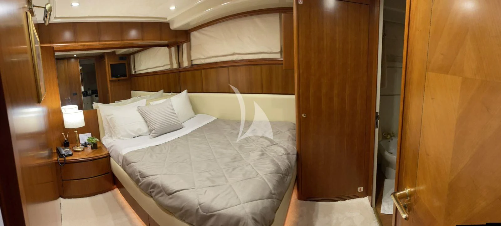 a bed in a room aboard ILLYA F Yacht for Charter