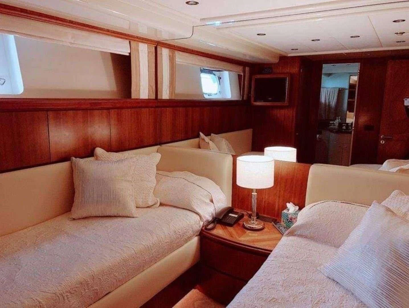 a room with two beds aboard ILLYA F Yacht for Charter