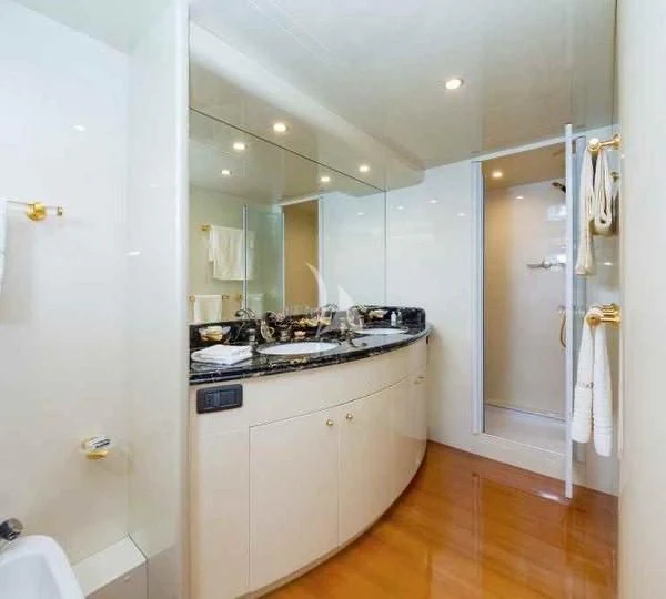a bathroom with a large mirror aboard ILLYA F Yacht for Charter