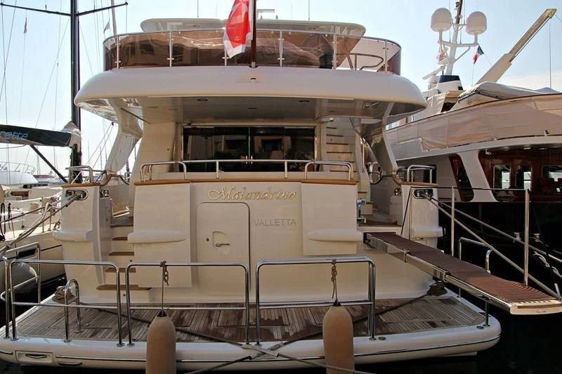 a large white ship aboard MALANDRINO Yacht for Sale