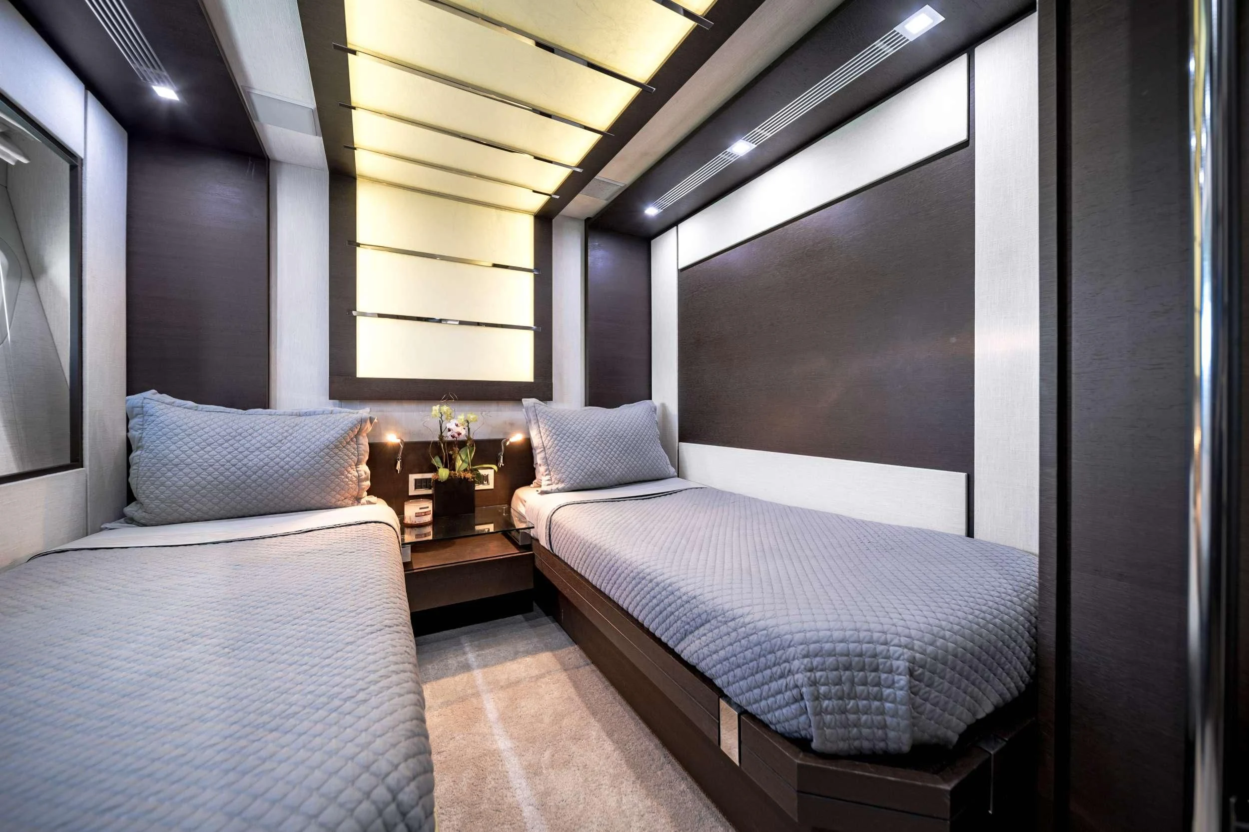 a room with two beds aboard SETTE Yacht for Sale