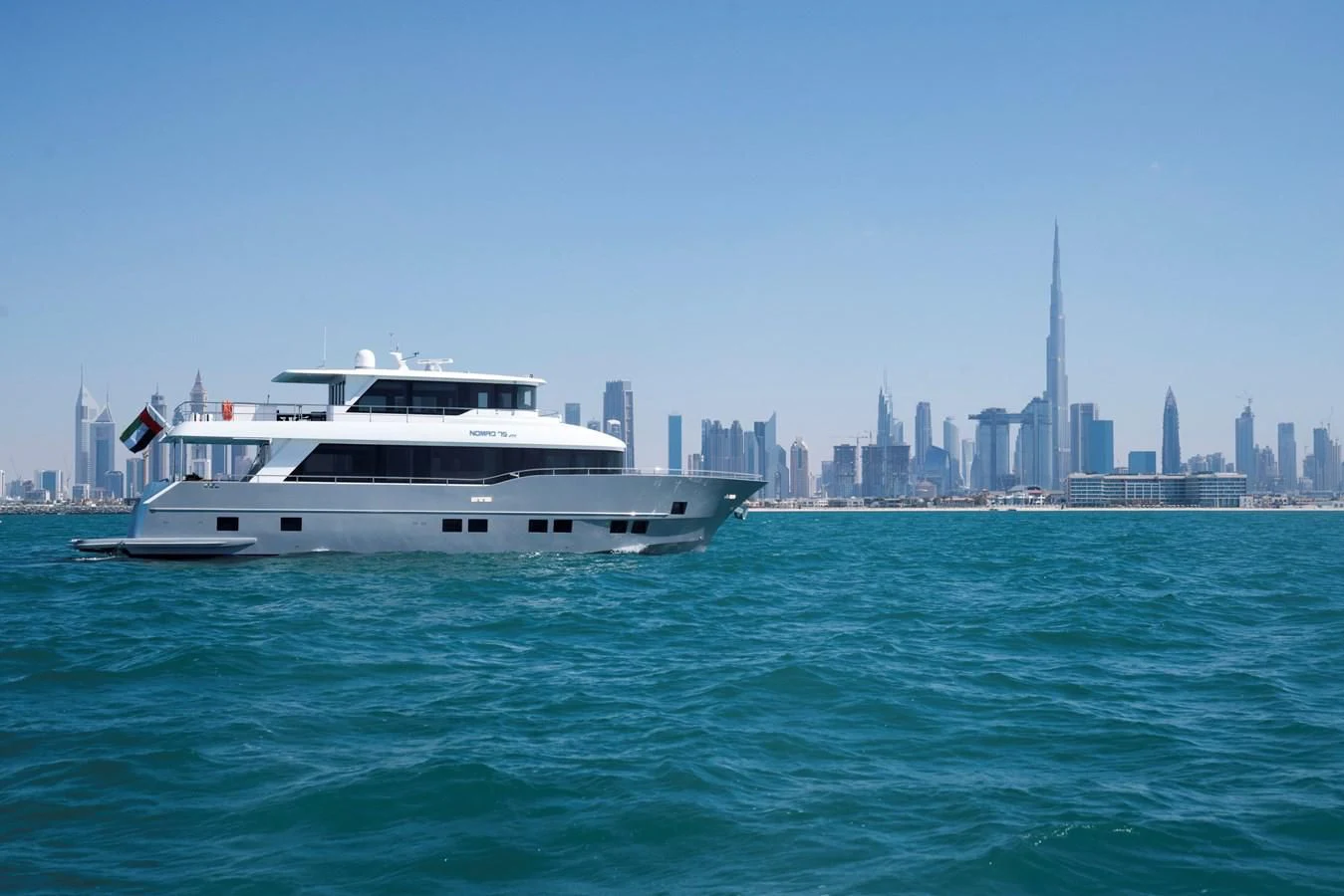 a boat in the water aboard NOMAD 70 SUV Yacht for Sale