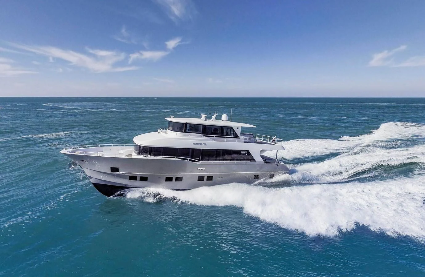 a boat in the water aboard NOMAD 70 SUV Yacht for Sale